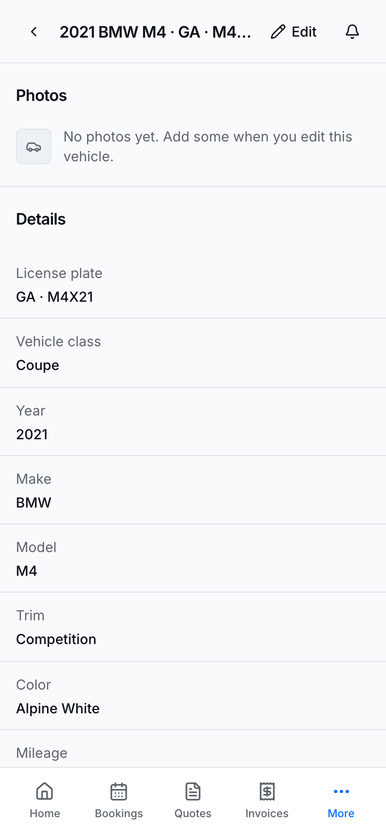Vehicle detail with year, make, model, and plate on file